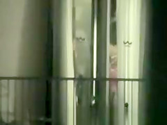 Peeping throughout hotel bedroom window