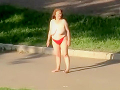 Drunk mature woman walks topless