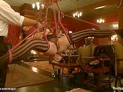 Bondman Playing With Cutlery At Party