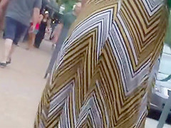 Hot playgirl walks by a construction yard