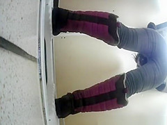 Woman squats and pees