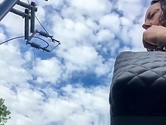 Fat woman in dark miniskirt upskirt