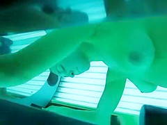 Woman spied in tanning sofa