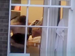 woman spied throughout window