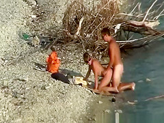 Nudist pair fucking by the water