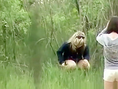 Woman and ally peeing outdoors