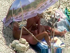 Older nudist golden-haired strokes her man’s cock