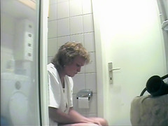 Aged is being filmed when urinating in the washroom