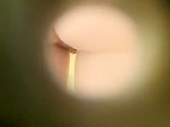 Dilettante acquires her pussy taped trough the gap in the wall