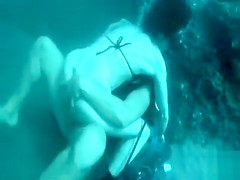 Scuba diving pair copulates in the ocean