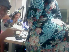 Our bootylicious producer in a suit has her massive butt bitten on by a colleague