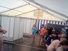 Exposed actresses in public shower cabins