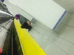 Nasty purple-haired honey makes water at the subway