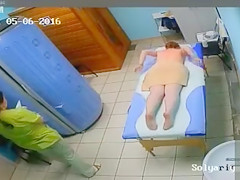 Lady with petite milk shakes disrobes previous to a massage