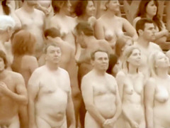 Thousands of people pose totally undressed for an art creation