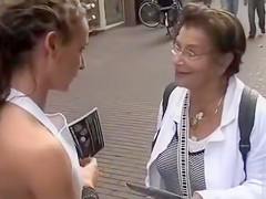 Sales promoters have visible booties whilst interviewing strangers