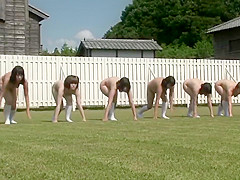 Playful Japanese bimbos run around the soccer field totally nude