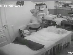 Aged woman discloses her big saggy milk sacks at the massage parlour