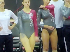 Alluring gymnast with large gazoo performs some awesome moves