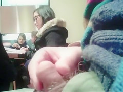 Brave lad strokes his shlong in the public library