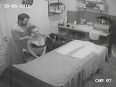 Dark Brown doll removes her top and acquires a relaxing massage