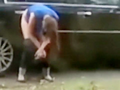 Hopeless hottie pees on a public suburban street
