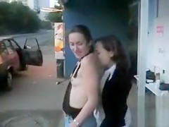 Playful Russian honey whips out her mangos and let a lascivious pair touch her