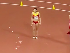 Raven-haired brawny chick competes in lengthy jump