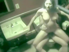 Security webcam captures pair fucking in restroom