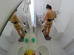 Glamorous housewife removes her raiment in order to wash her soaked holes