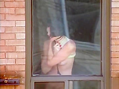 Kinky lady in latex suit does a nasty dance