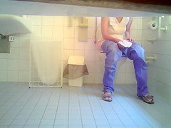 Beauty in jeans makes water in the ladies room