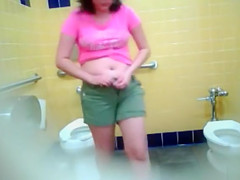 Latin Chick gals receive caught on spycam pissing indeed hard