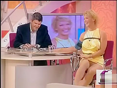 Italian diva in a short yellow costume shows off her lengthy legs