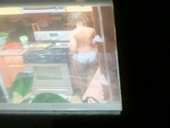 Dark dilettante walks around the abode with her saggy mounds out