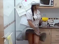 Cooking woman and her heavenly bottom