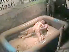 Mud wrestling cuties at the bar make a hawt mess