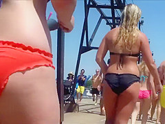 Large female wazoo in an orange bikini is stunning