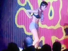 Striptease on a balance board for a game show