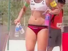 Cute beach volleyball players with great bodies