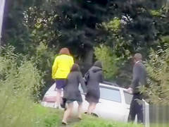 Bunch of bridesmaids taking a collective pee