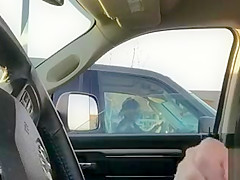 Housewife in a SUV watches him stroke