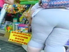 Russian big beautiful woman on the street has a chunky butt in taut panties