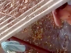 Spying on a topless angel showering outdoors