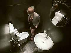 Public service announcement with a woman using a throne-room