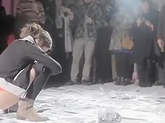 Pissing protest with photos of political leaders moist