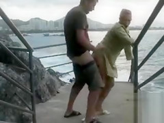 Pounding her love gap by the sea