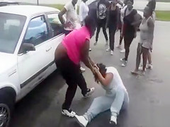 Angry darksome sweethearts fight in a parking lot