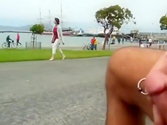 Wanking the pierced knob on the coast