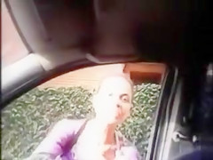 Stranger receives in the car to give him a tugjob